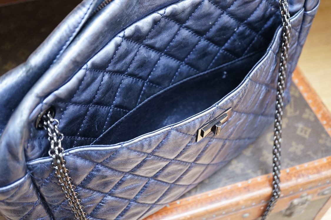 A Chanel metallic 2.55 re-issue quilted camera bag, date code 12407681, 35cm wide